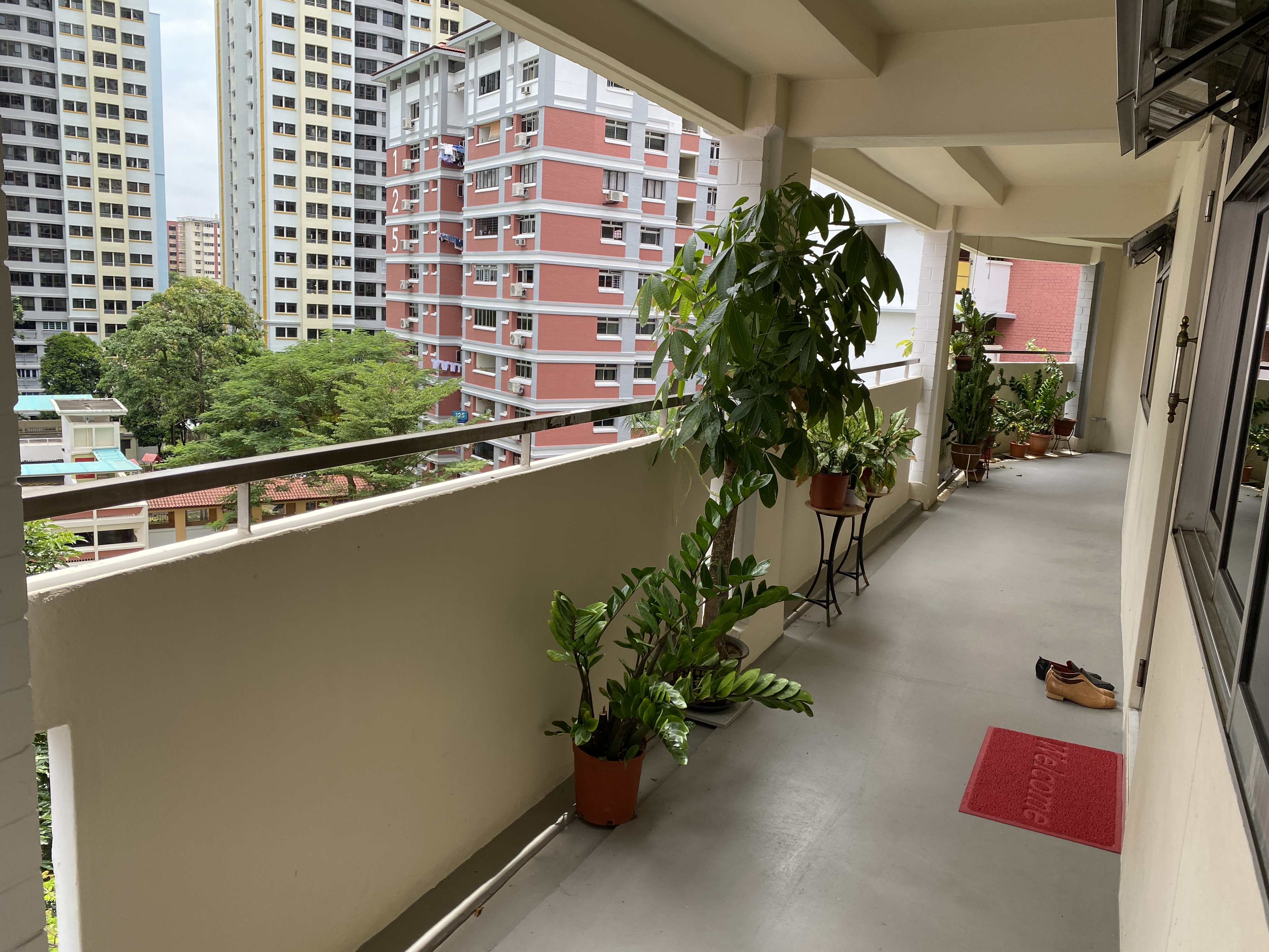 A bright HDB residential corridor in Singapore