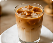 Iced latte in a clear glass with ice cubes